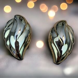 Large clip on gold tone earrings. Vintage estate jewelry